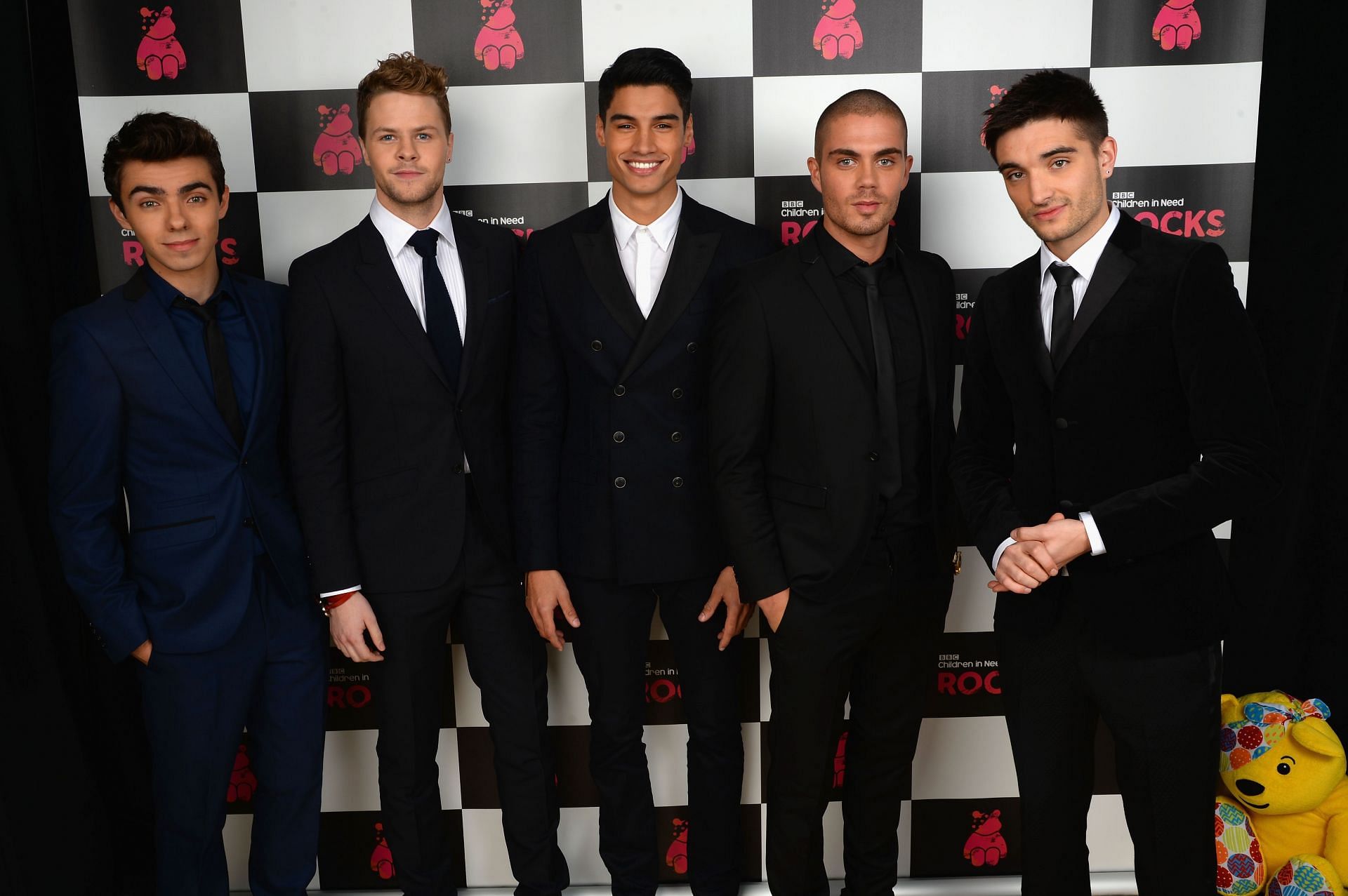 Nathan Sykes, Jay McGuiness, Siva Kaneswaran, Max George, and Tom Parker (Right) of The Wanted pose backstage during the 'BBC Children In Need Rocks' (Image via Getty)